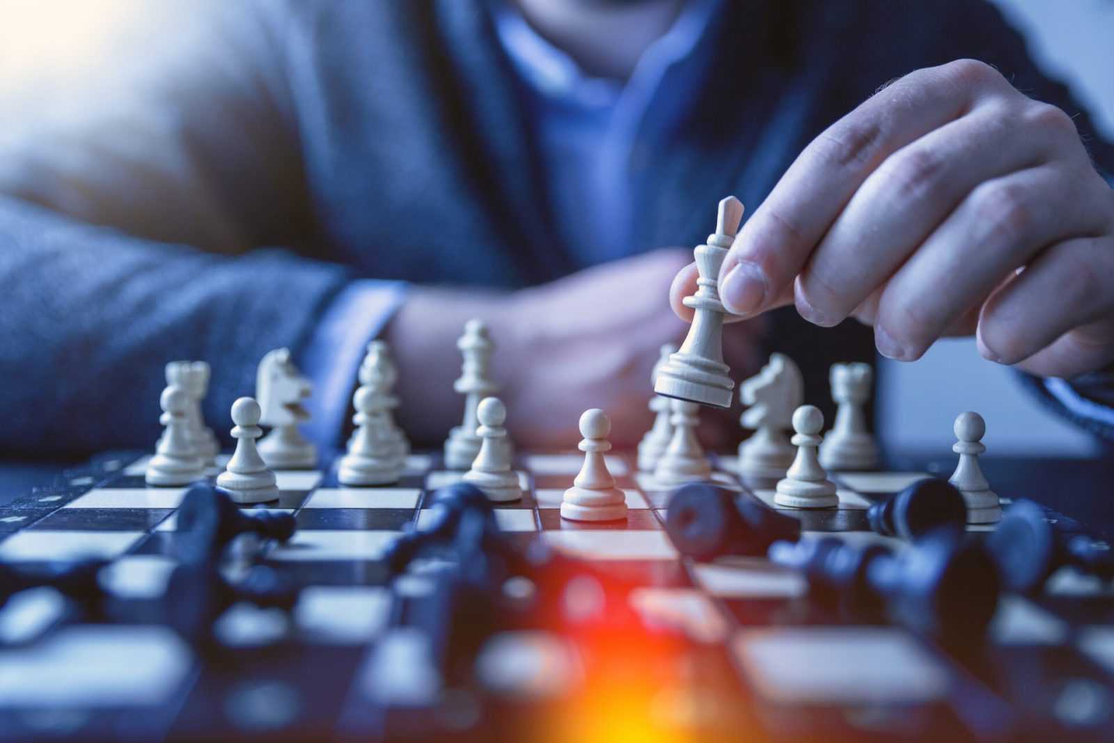 Playing a game of chess to depict strategic thinking