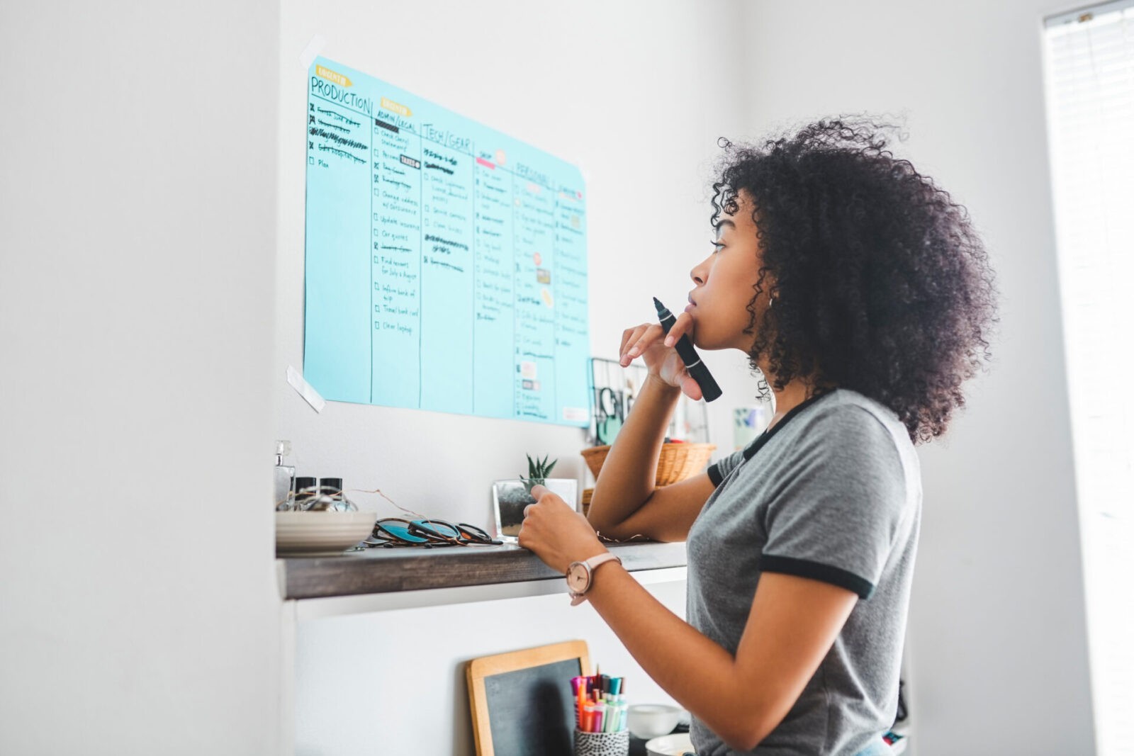 Woman examines her to-do list